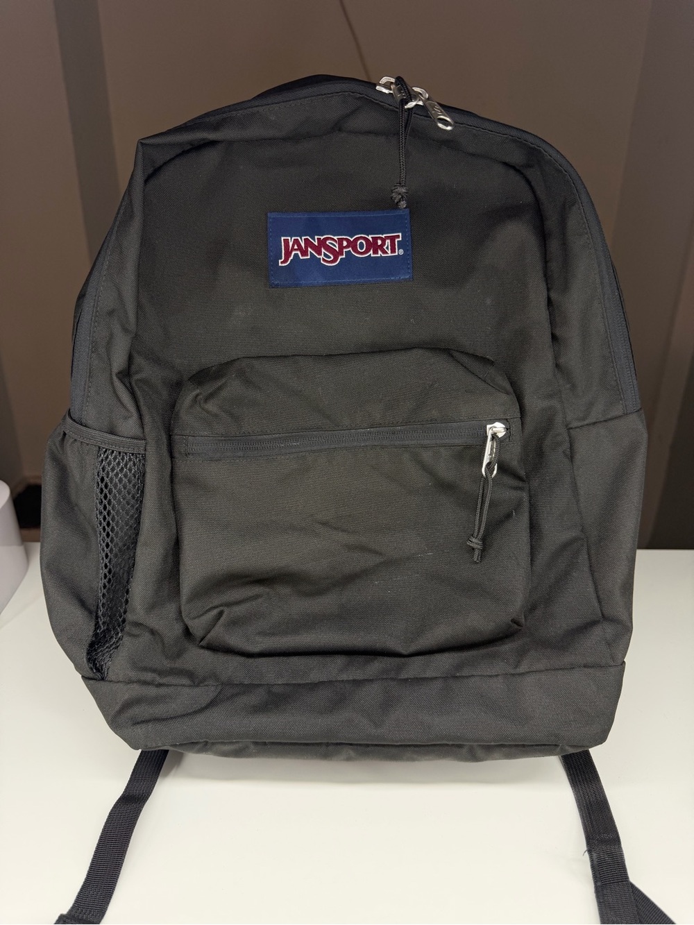 Jansport Black Classic Backpack with Navy Logo Patch